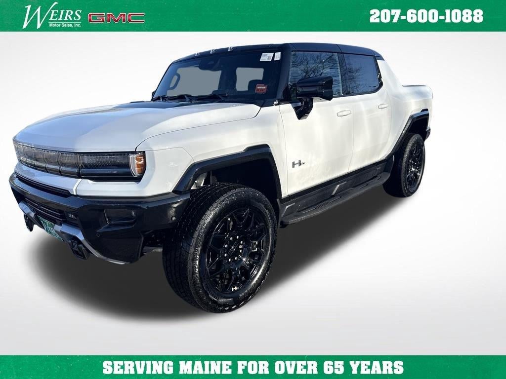 2026 GMC HUMMER EV Pickup 2X in Interstellar White — front three-quarter view