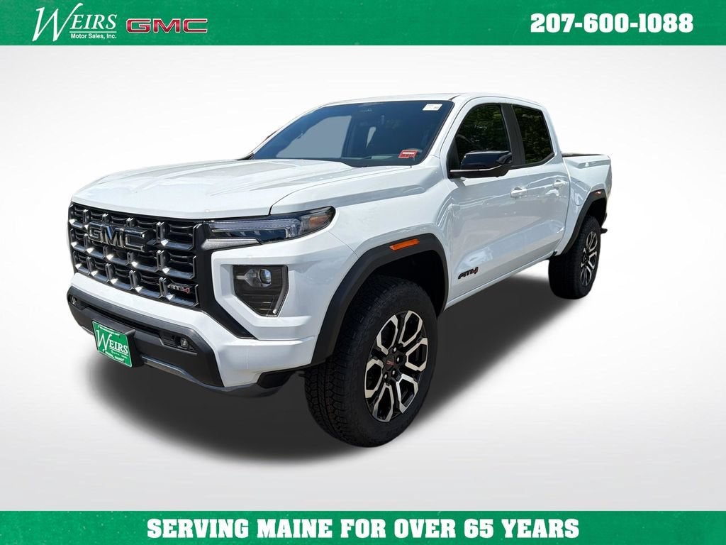 2026 GMC Canyon AT4 in Summit White — front three-quarter view